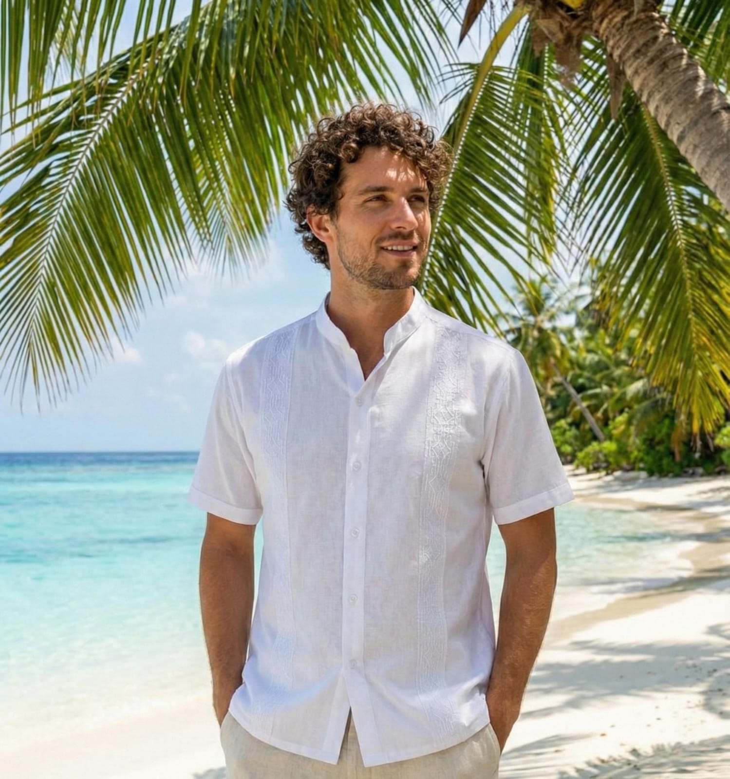 Elegancia caribeña atemporal. Esta guayabera combina la tradición con la máxima frescura. Confeccionada en un tejido ligero y transpirable, presenta los clásicos bordados verticales y alforzas que definen su estilo, junto con dos bolsillos funcionales en la parte inferior. La prenda perfecta para bodas en la playa, cenas al atardecer o para elevar tu estilo vacacional.